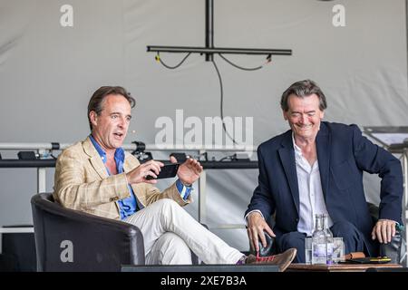 BROADCHALKE, WILTSHIRE, UK, 26th June, 2024, Feargal Sharkey talks about the importance of the Chalk Stream with Guy Walters at Chalke History Festival, the UK's leading history festival. The event attracts hundreds of thousands of history enthusiasts, including tens of thousands of school children. Credit John Rose/Alamy Live News Stock Photo