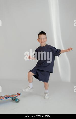 Happy little boy smiling and have fun isolated on white background, Full body composition and five years old Stock Photo