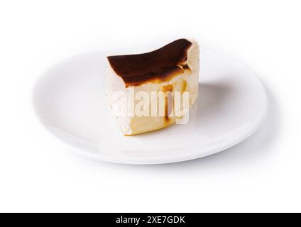 San sebastian cheesecake on plate isolated Stock Photo