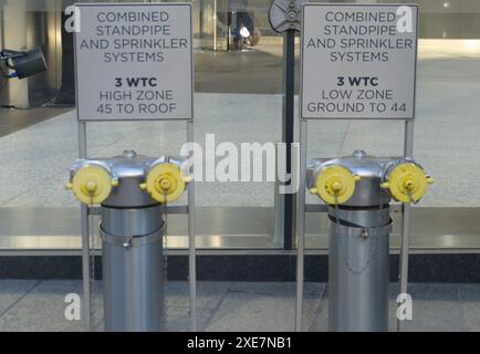 18th June 2024 - New York City, USA - Two fire hydrants serving World Trade centre buildings in New York Stock Photo