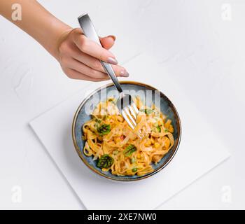 Italian spaghetti on fork close up Stock Photo