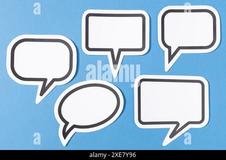 Set of Blank Speech Bubble isolated on blue background. Mock up template Stock Photo