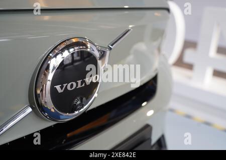 In this photo illustration a Volvo logo at auto show in Hong Kong, China Stock Photo