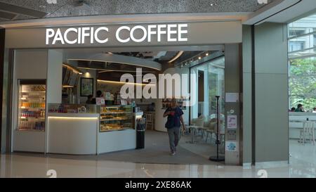 Hong Kong, China. 26th June, 2024. A photograph shows a customer holds a cup of coffee in the coffee house chain from Hong Kong, Pacific Coffee logo and store in Hong Kong, China (Credit Image: © Serene Lee/SOPA Images via ZUMA Press Wire) EDITORIAL USAGE ONLY! Not for Commercial USAGE! Stock Photo