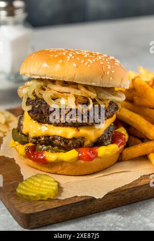 Homemade Chicago Big Baby Cheeseburger with Pickles and Onions Stock ...