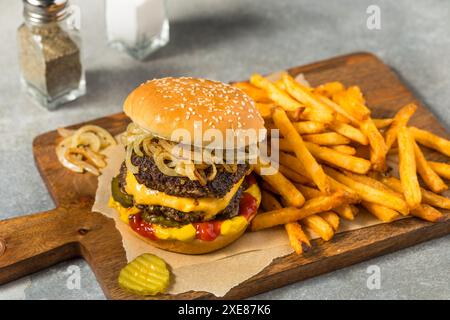 Homemade Chicago Big Baby Cheeseburger with Pickles and Onions Stock ...