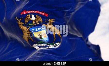 Michigan state flag waving in the wind on a clear day Stock Photo