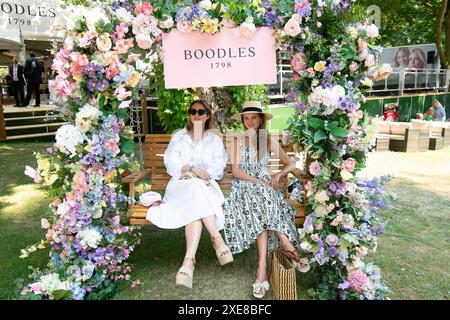 Stoke Poges, UK. 26th June, 2024. Guests enjoying the atmosphere on another beautiful sunny day at the Boodles Tennis at Stoke Park in Stoke Poges, Buckinghamshire. Credit: Maureen McLean/Alamy Live News Stock Photo