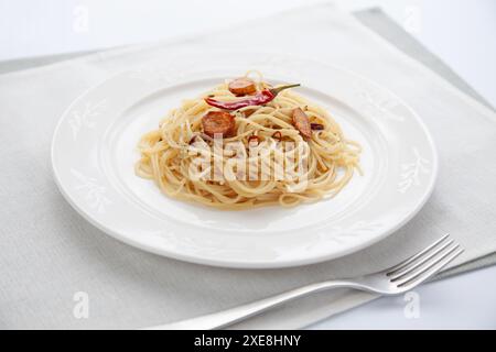 spaghetti aglio olio peperoncino italian on table Stock Photo