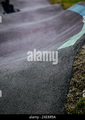 Bumpy Running Track Asphalted bicycle race track, pump track, kids playground Stock Photo ...