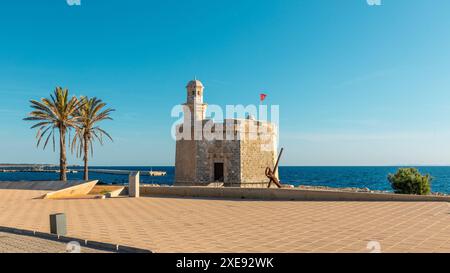 Sant Nicolau Castle in Ciutadella, Menorca, historic architecture standing on the seafront, Afternoon sun, Spain, Balearic Islands Stock Photo