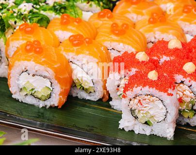 Big set of rolls with wasabi and pickled ginger Stock Photo