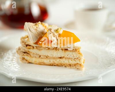 Cake with cream-cheese and persimmons Stock Photo