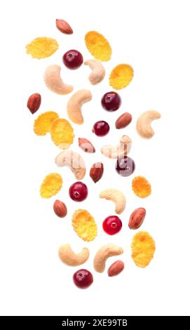 Falling berries with nuts and corn flax isolated Stock Photo