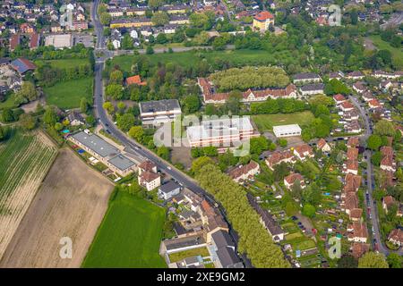 Aerial view, Sodingen secondary school and Castroper Straße sports hall, Teutoburgiahof group of houses with green area of trees in the inner courtyar Stock Photo