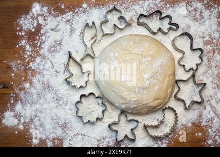 dough on the table with dough tools. forms for squeezing the dough Stock Photo