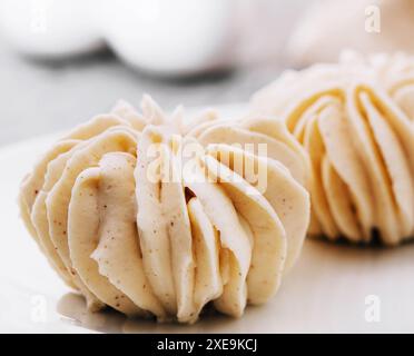 Closeup vanilla cream on white plate Stock Photo