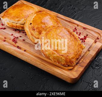 Homemade flaky pasty with mince meat filling Stock Photo