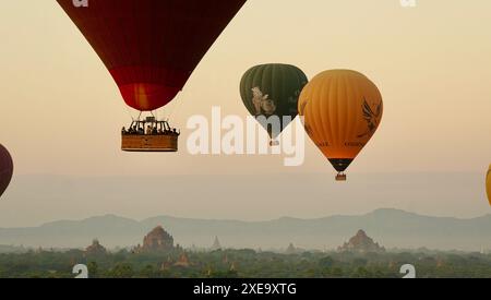 Hot air balloons flying over the temples in Bagan, Myanmar Stock Photo