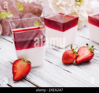 Panna cotta with jelly strawberries, italian dessert Stock Photo