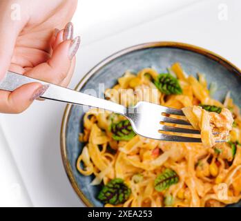 Italian spaghetti on fork close up Stock Photo