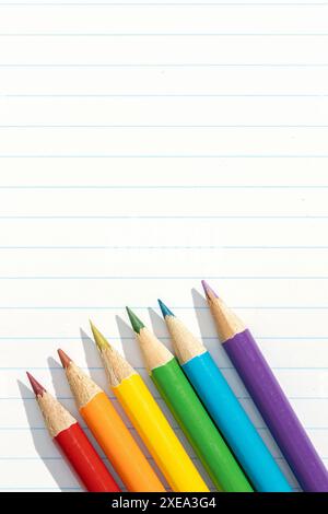 Colored pencils arranged in a formation resembling the pride flag. Copy space Stock Photo