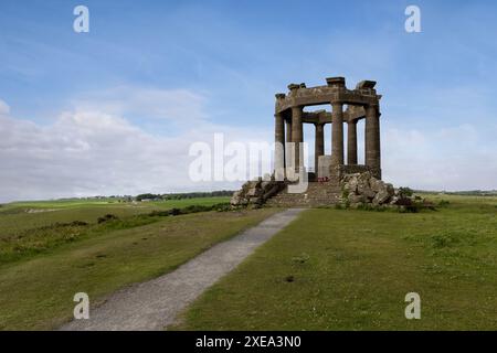 The iconic War Memorial with view to Dunnottar Castle near Stonehaven in Aberdeenshire. Stock Photo