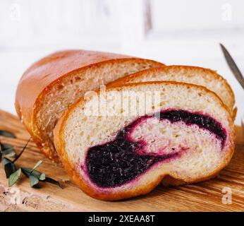 Homemade sweet cherry loaf cake on board Stock Photo