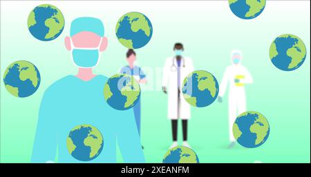 Image of falling globe icons over hospital staff Stock Photo