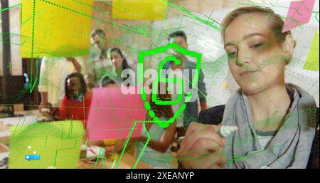 Image of padlock icon over diverse people at office Stock Photo