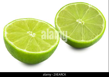Two halves of a lime isolated on a white background. Stock Photo