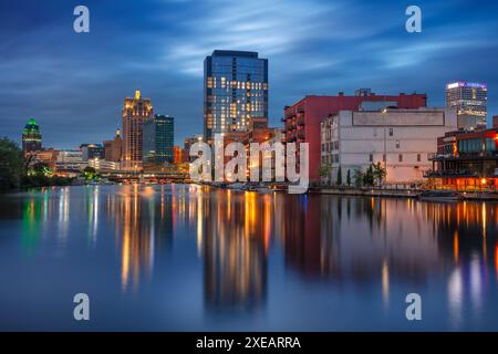 Milwaukee, Wisconsin, USA. Cityscape image of downtown Milwaukee, Wisconsin, USA with reflection of the skyline in Mnemonee River at twilight blue hou Stock Photo