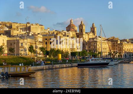 The view of Cospicua city from the water of Dockyard creek. Bormla. Malta Stock Photo