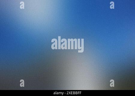 Grainy texture blending a blue and grey gradient background Stock Photo