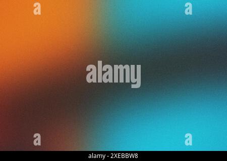 Orange and blue colors blend in abstract background with a textured grainy effect Stock Photo