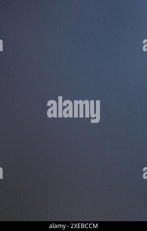 Dark blue background providing copy space with gradient and grainy texture Stock Photo