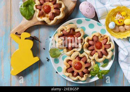 Pizza in puff pastry with cheese and tomatoes. Stock Photo
