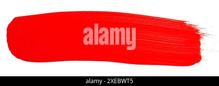 Red paint brush stroke isolated on white background, clipping path included. Stock Photo