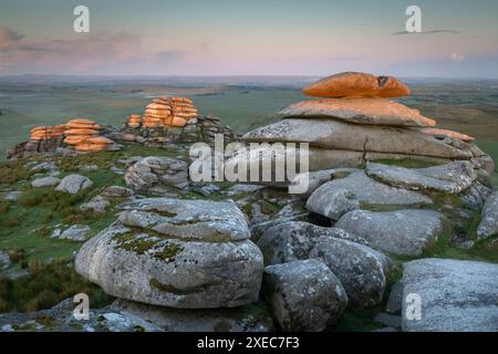 First light on Roughtor at sunrise, Bodmin Moor, Cornwall, England. Spring (June) 2019. Stock Photo