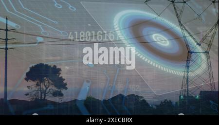 Image of changing numbers, circuit board pattern, circles over transmission towers on green land Stock Photo