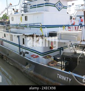 WASHINGTON (April 2, 2020) — Post collision view of the towing vessel Trinity involved in the Mar. 15, 2019, collision with the towing vessel Dixie Vandal in the Houston Ship Channel. The photo taken on March 20, 2019, in Houston shows damage to Trinity’s starboard side from the impact of the barge Kirby 29751. This photo taken on March 20, 2019 in Houston shows damage to Trinity’s starboard side from the impact of barge Kirby 29751 Stock Photo