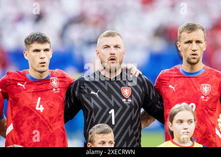 Hamburg, Germany. 26th June, 2024. Robin Hranac (4), goalkeeper Jindrich Stanek (1) and Tomas Soucek (22 of Czechia seen during the UEFA Euro 2024 match in Group F between Czechia and Turkey at Volksparkstadion in Hamburg. Credit: Gonzales Photo/Alamy Live News Stock Photo