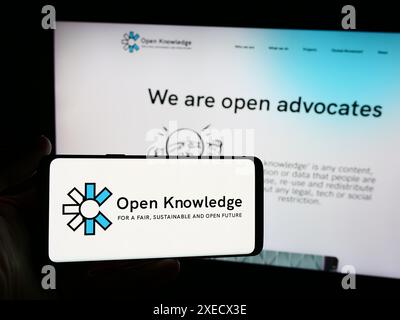 Smartphone with logo of global organisation Open Knowledge Foundation ...