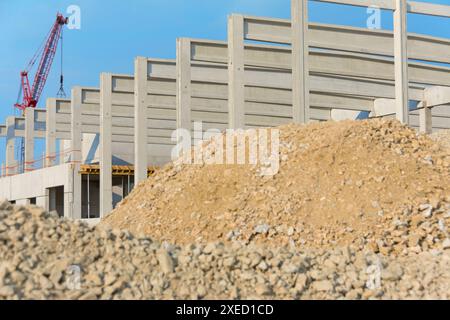 Construction site with shell, crane and building material Stock Photo