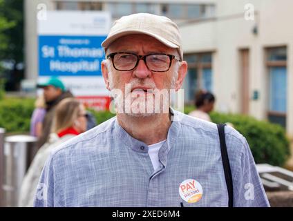 London, UK. 27th June, 2024. Jeremy Corbyn. BMA Junior doctors on a picket line outside St Thomas Hospital over their long-running pay dispute with the government. They were joined by former Labour leader Jeremy Corbyn. They are demanding a 35% pay rise. About 25,000 junior doctors are expected to refuse to work during the five-day stoppage, which begins at 7am today and runs until the same time next Tuesday, 2 July. Credit: Mark Thomas/Alamy Live News Stock Photo