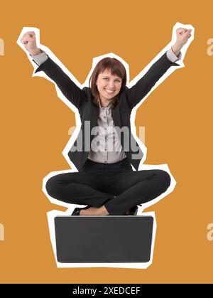 Young smiling young business woman sitting with laptop with hands raised high up excited. Magazine style isolated business conce Stock Photo