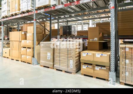 Rows of shelves with boxes in Ikea store in Moscow Stock Photo