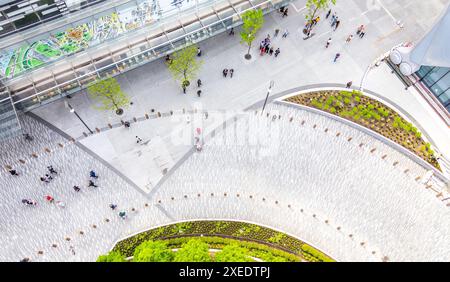 New York City, USA - May 17, 2019: Aerial Top View of square near Hudson Yards mall with walking people in New York. Stock Photo