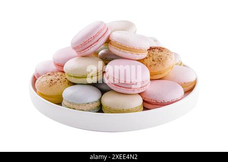 Multicolored macaroons on ceramic plate isolated on white Stock Photo