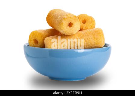 Roller corn snack in blue ceramic bowl isolated on white background. Stock Photo